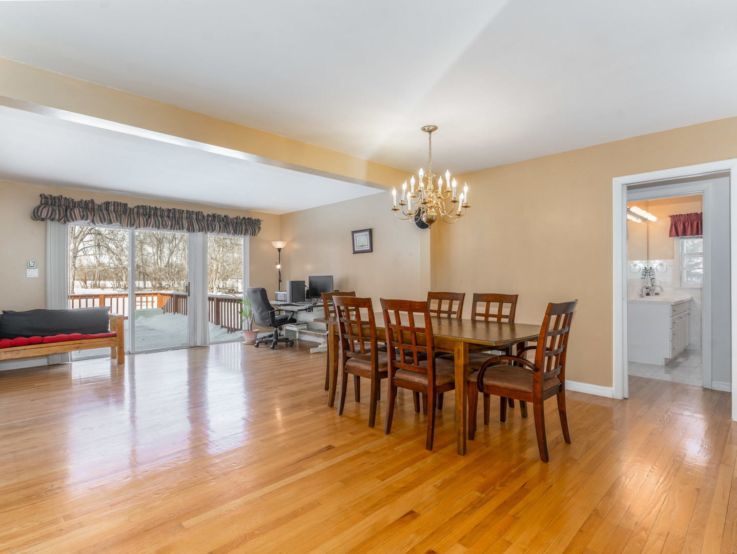 178 Brookhill Road Libertyville, IL 60048 - Photo 12 of 39 a dining room with furniture wooden floor a rug and a chandelier