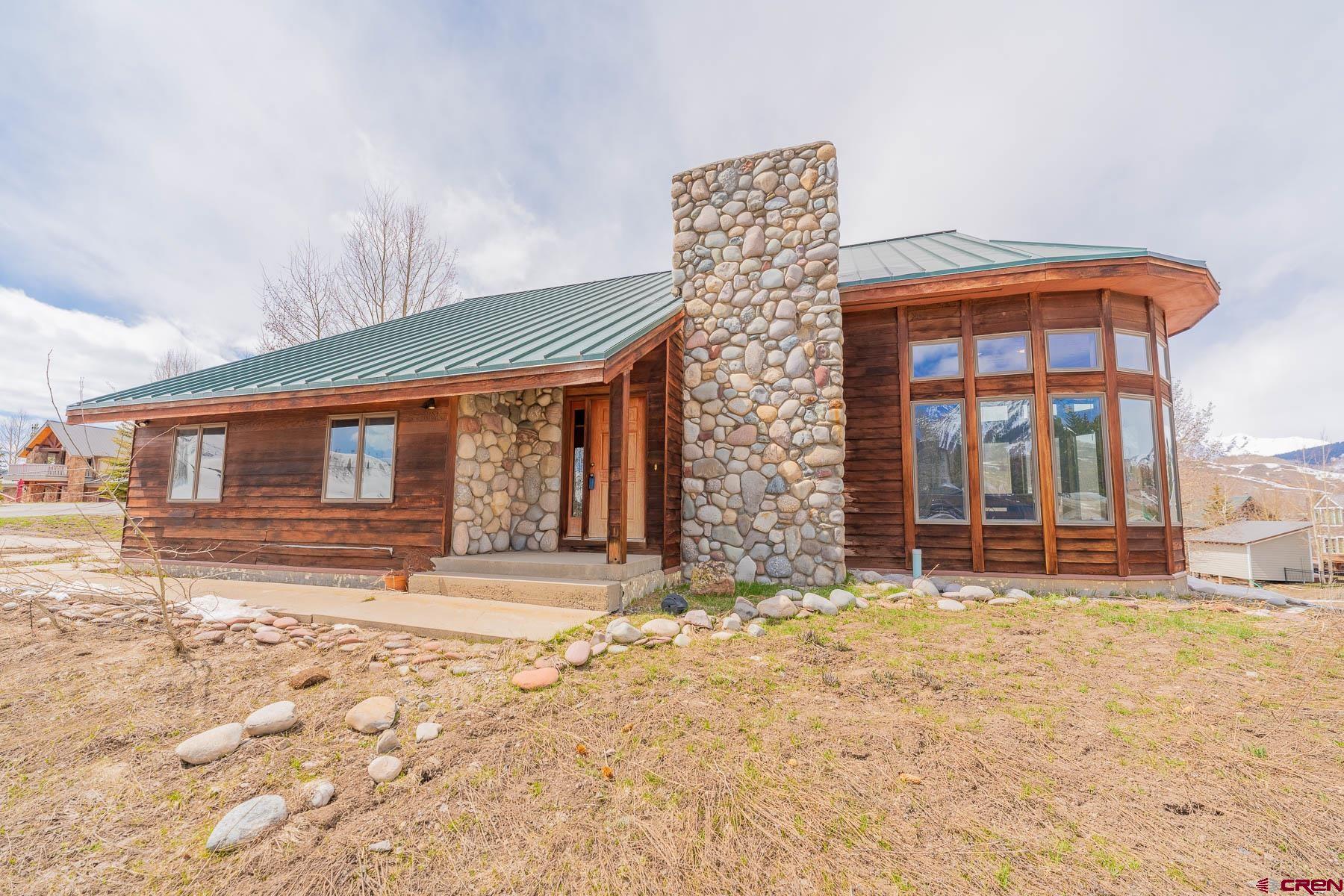 10 Arrowhead Circle Crested Butte, CO 81225 - Photo 2 of 33 a front view of a house