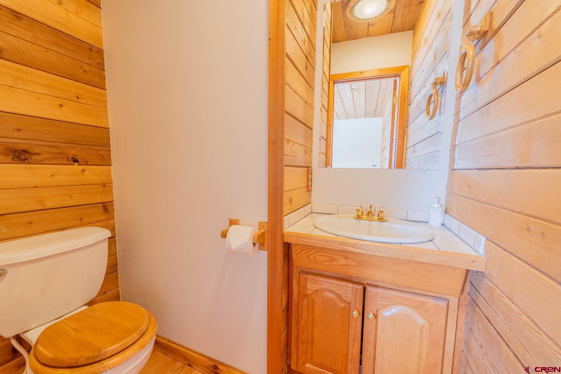 10 Arrowhead Circle Crested Butte, CO 81225 - Photo 24 of 33 a bathroom with a sink and a toilet