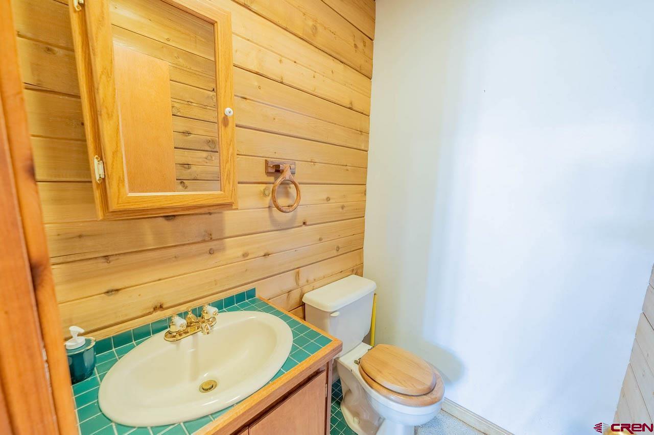 10 Arrowhead Circle Crested Butte, CO 81225 - Photo 27 of 33 a bathroom with a sink and a mirror