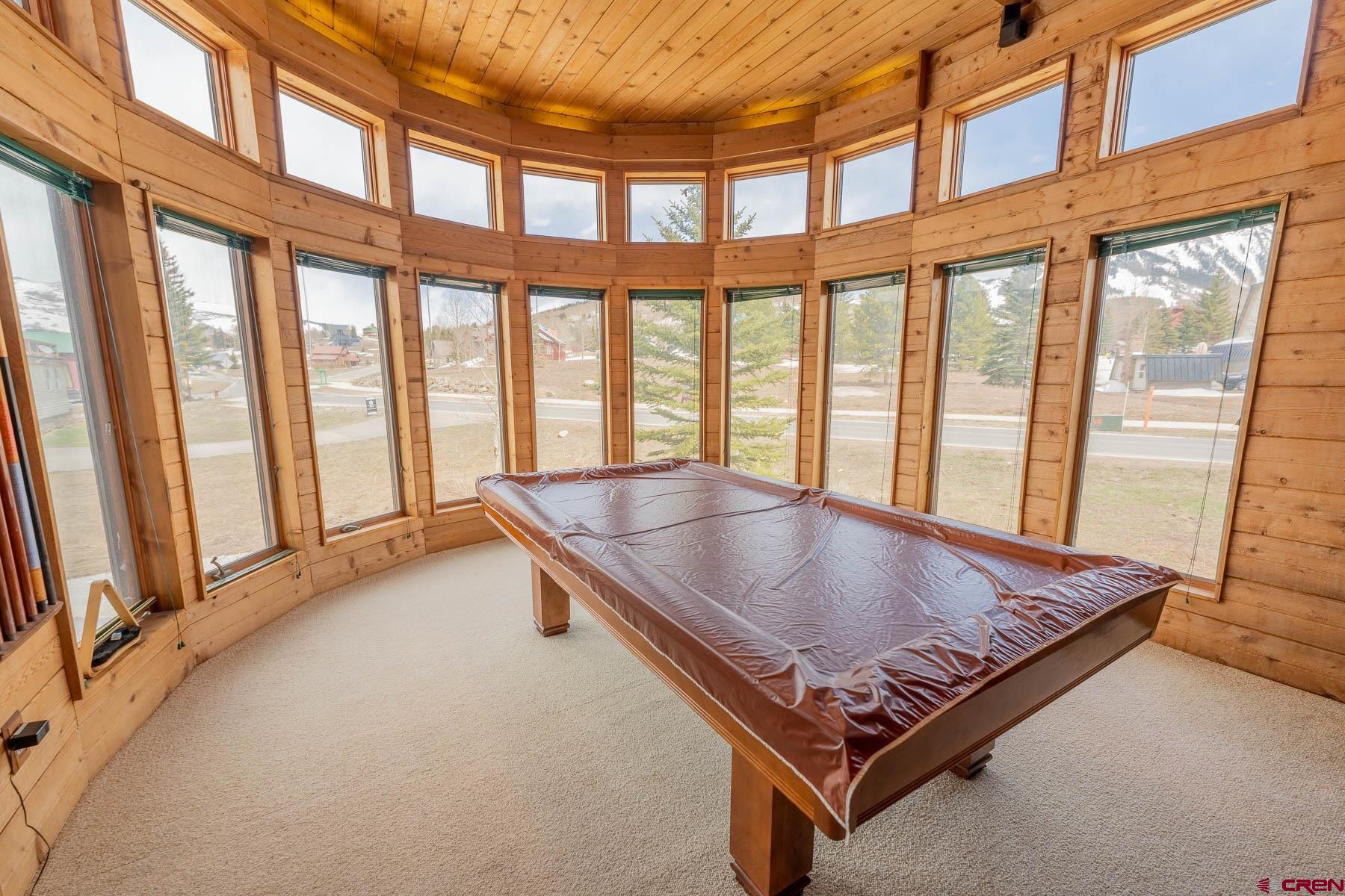 10 Arrowhead Circle Crested Butte, CO 81225 - Photo 6 of 33 a living room with large window