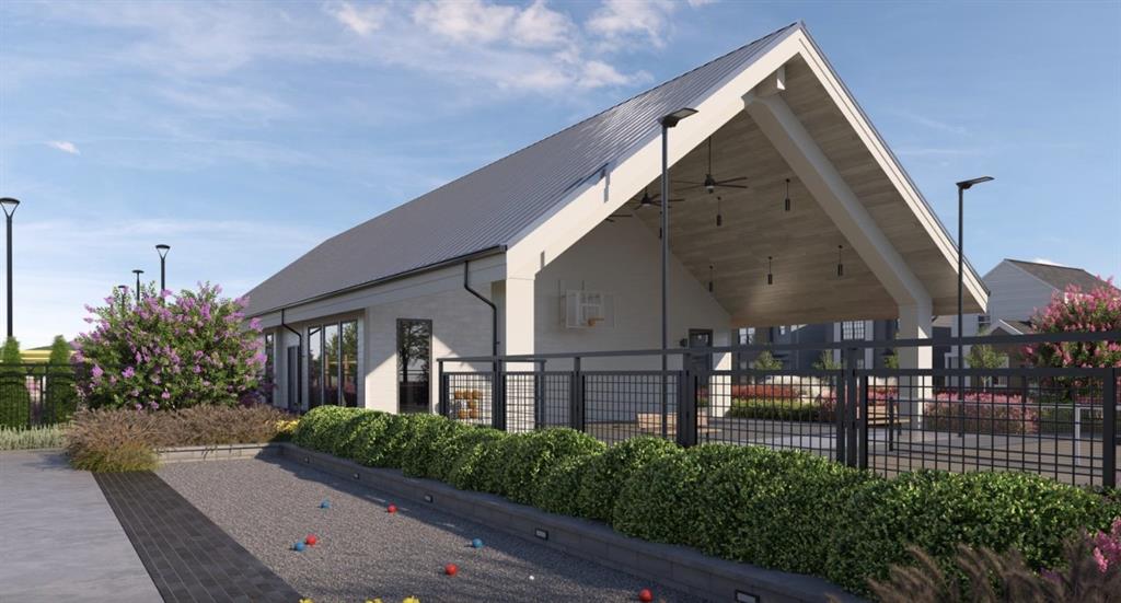 9032 Prairie Path, Unit 8903 Rowlett, TX 75089 - Photo 20 of 28 a front view of a house with garden