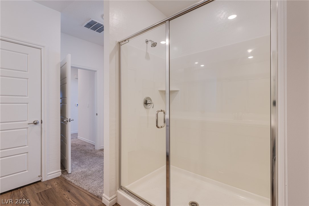 2555 Hampton Road, Unit 8206 Henderson, NV 89052 - Photo 18 of 25 A sleek, enclosed shower stall stands ready for refreshing moments.