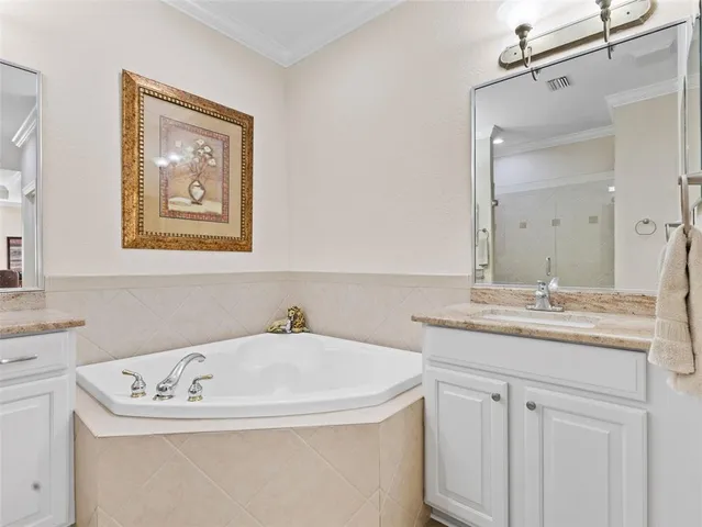 a bedroom with bed and window