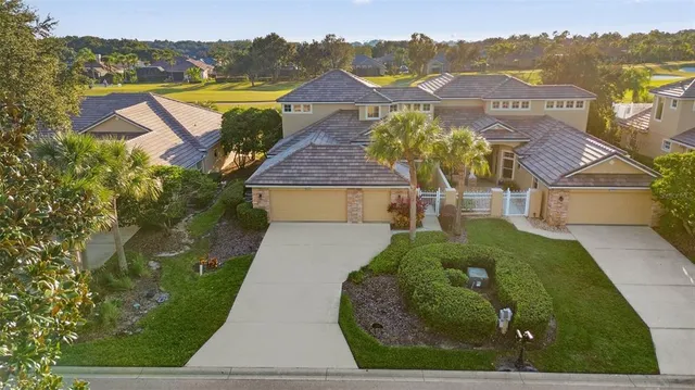 an aerial view of residential building with parking space