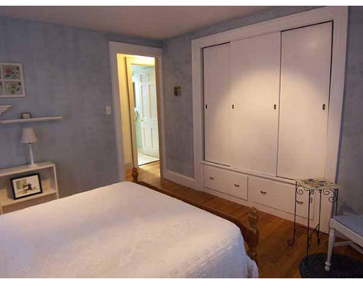 74 Ely Avenue West Springfield, MA 01089 - Photo 12 of 22 a bedroom with a bed and a window