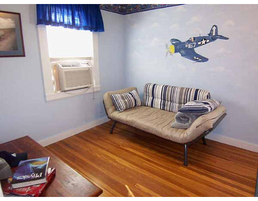74 Ely Avenue West Springfield, MA 01089 - Photo 14 of 22 a living room with furniture and a window