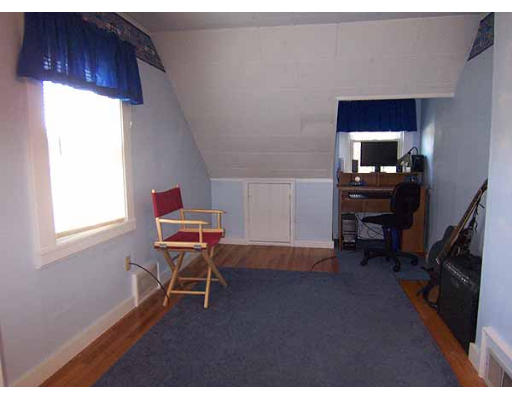 74 Ely Avenue West Springfield, MA 01089 - Photo 15 of 22 a living room with furniture and a wooden floor