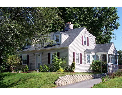 74 Ely Avenue West Springfield, MA 01089 - Photo 2 of 22 a front view of a house with a yard