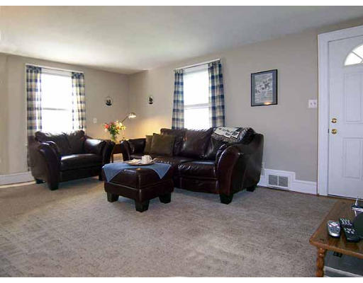 74 Ely Avenue West Springfield, MA 01089 - Photo 9 of 22 a living room with furniture and a window