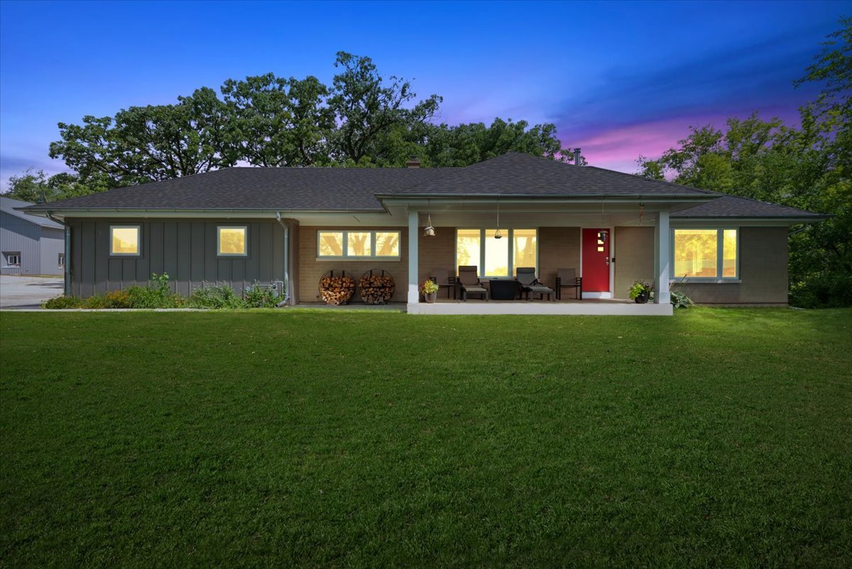 5908 Edgewood Road Crystal Lake, IL 60012 - Photo 23 of 60 a front view of a house with a garden and yard