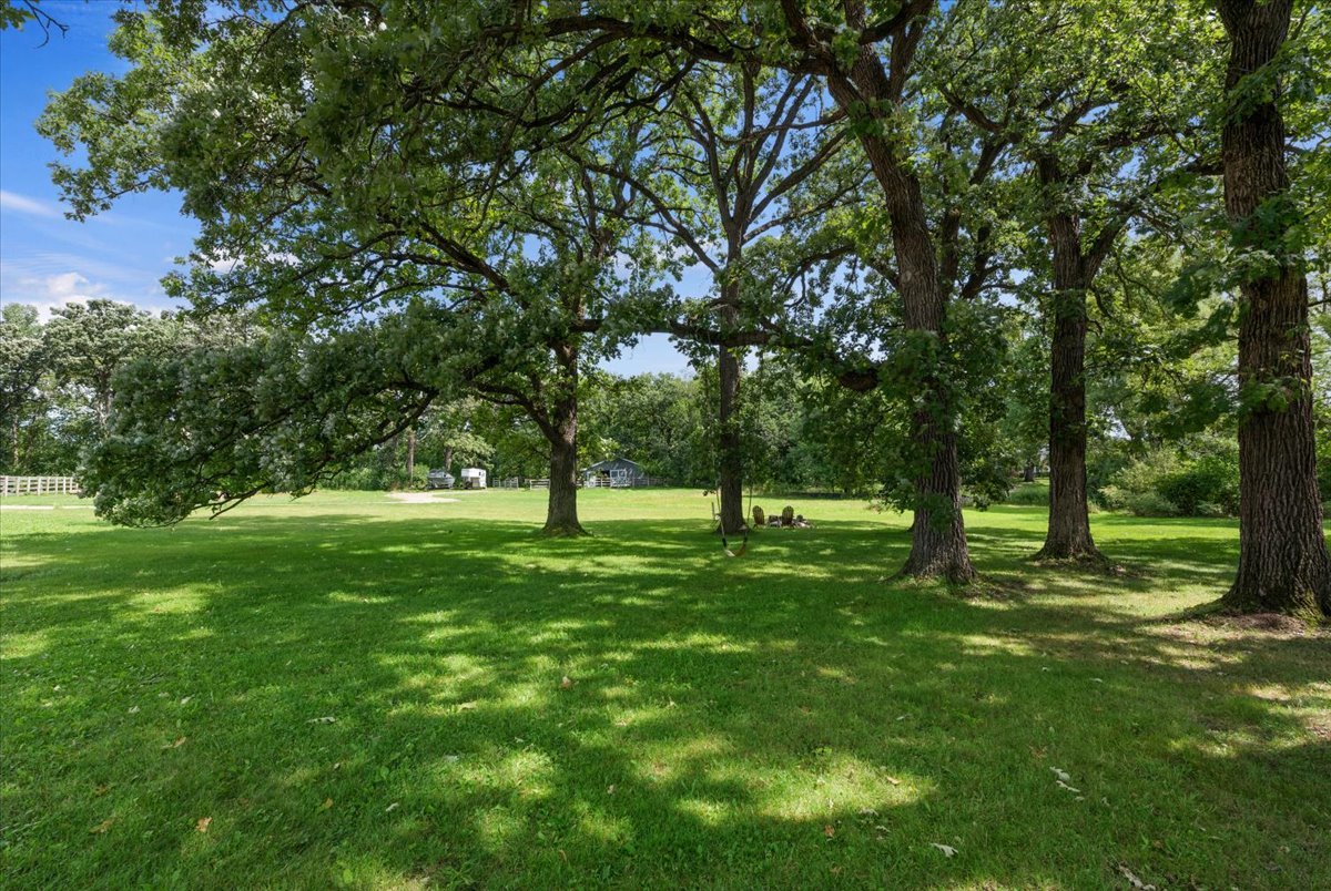 5908 Edgewood Road Crystal Lake, IL 60012 - Photo 24 of 60 a view of a backyard with trees