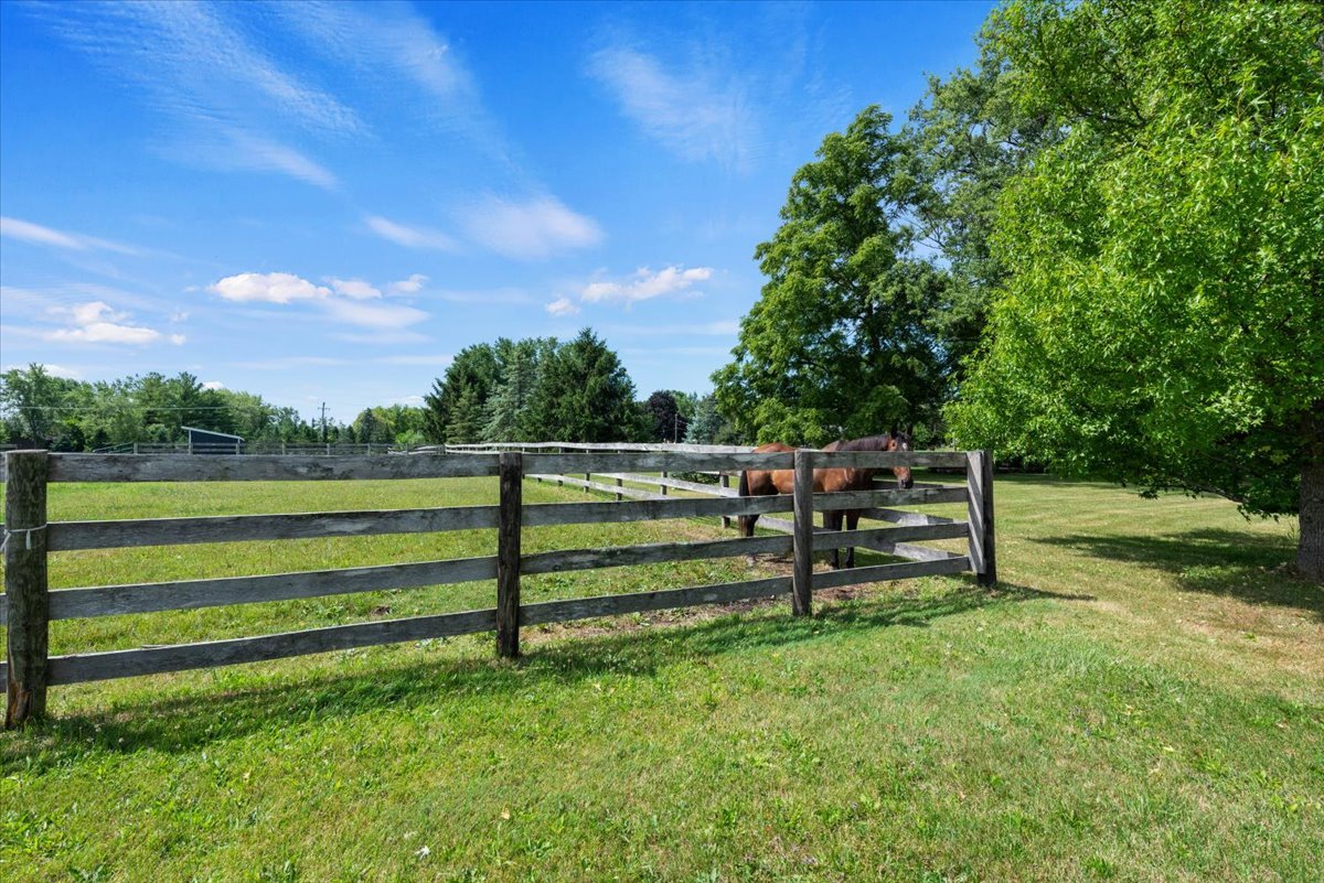 5908 Edgewood Road Crystal Lake, IL 60012 - Photo 3 of 60 a green field with trees in the background