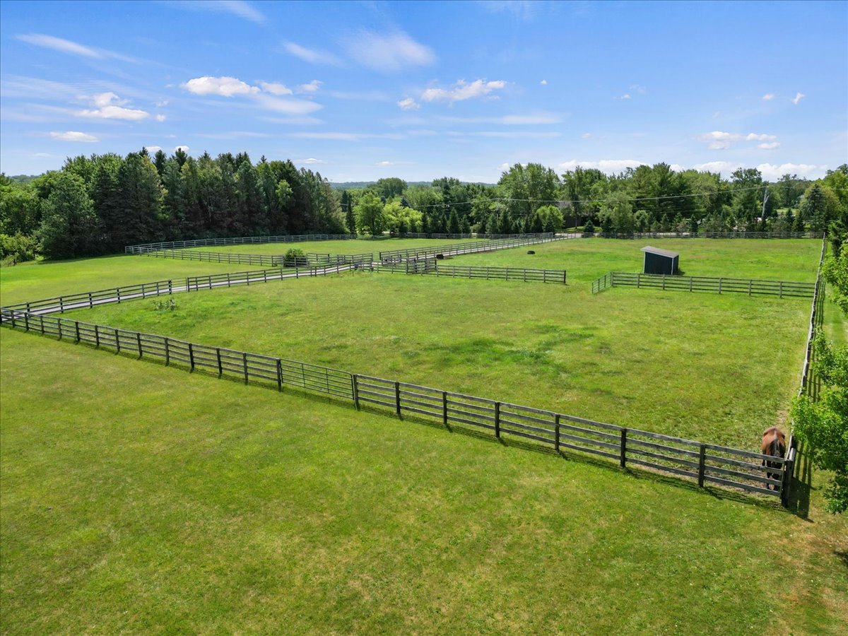 5908 Edgewood Road Crystal Lake, IL 60012 - Photo 5 of 60 a view of a green field with trees in the background