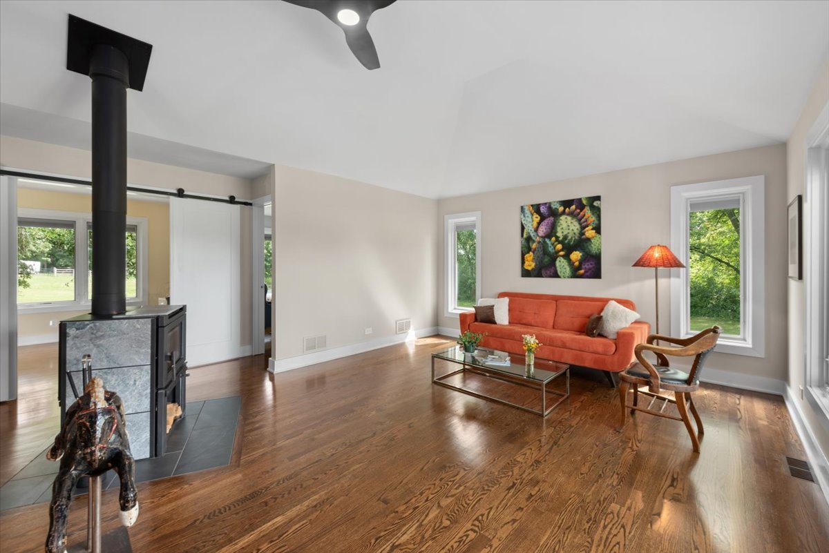 5908 Edgewood Road Crystal Lake, IL 60012 - Photo 9 of 60 a living room with furniture and a wooden floor