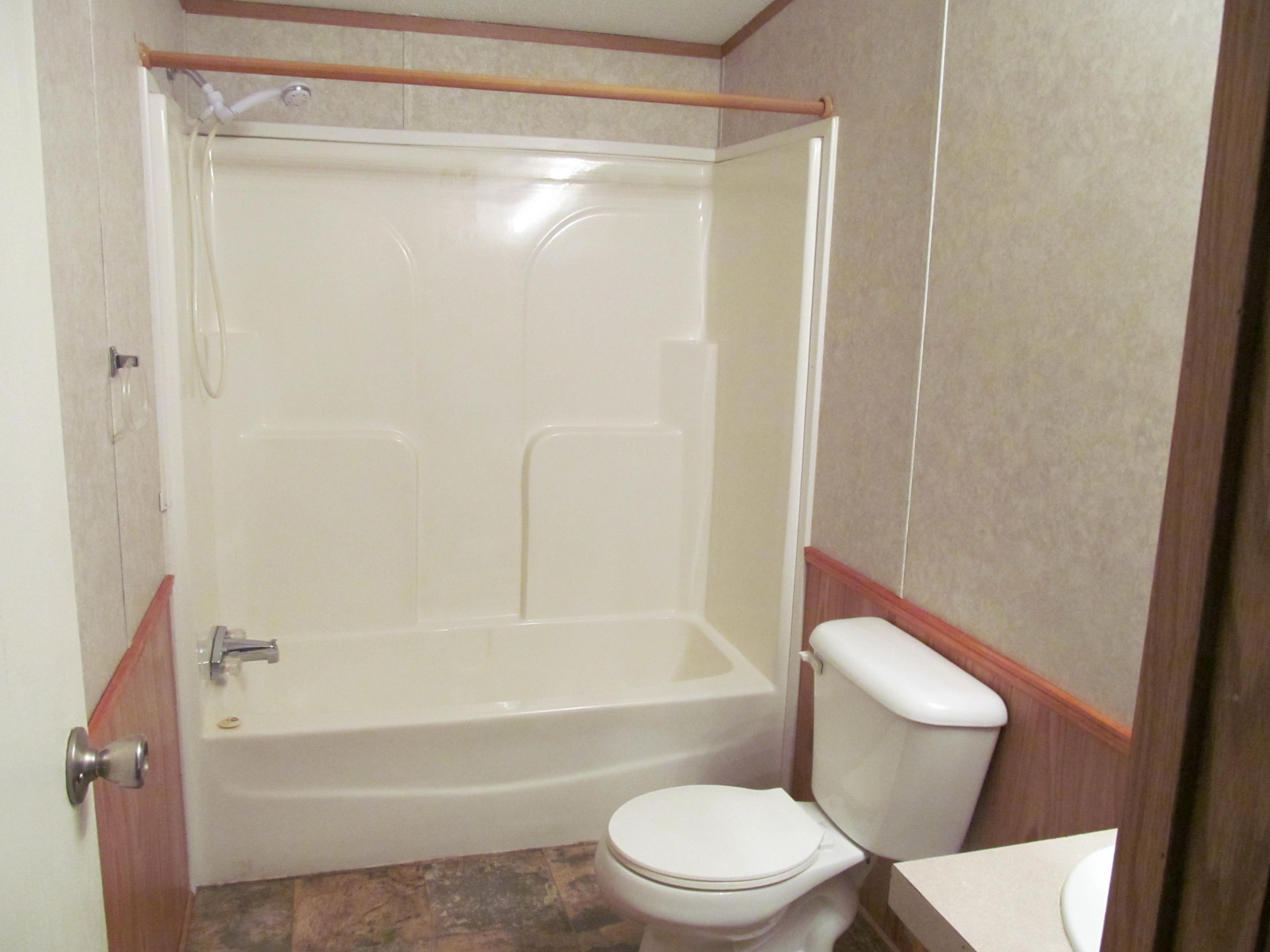 312 Piney Branch Road Blue Ridge, VA 24064 - Photo 12 of 21 a bathroom with a toilet and a bathtub