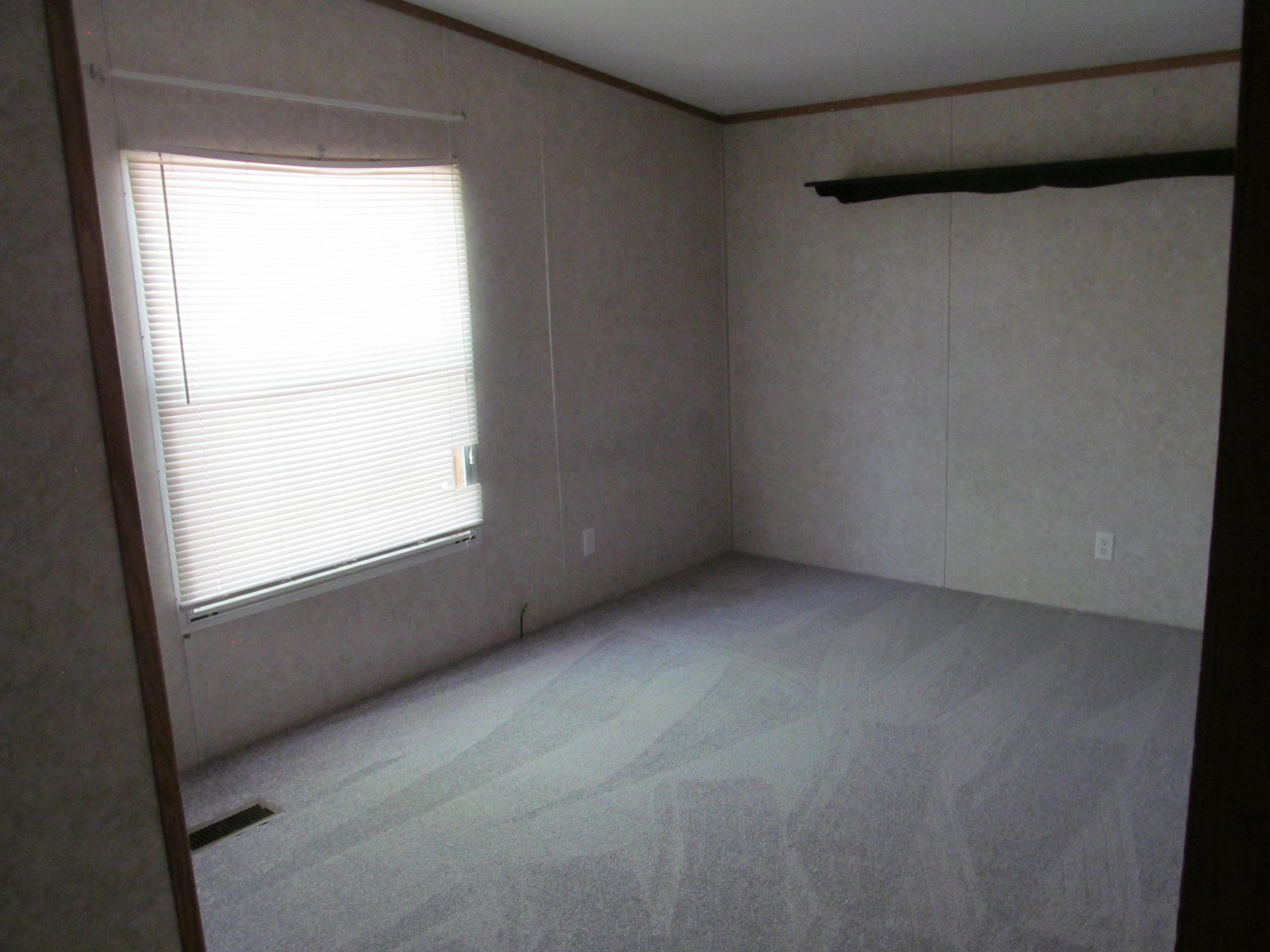 312 Piney Branch Road Blue Ridge, VA 24064 - Photo 13 of 21 a view of an empty room with a window