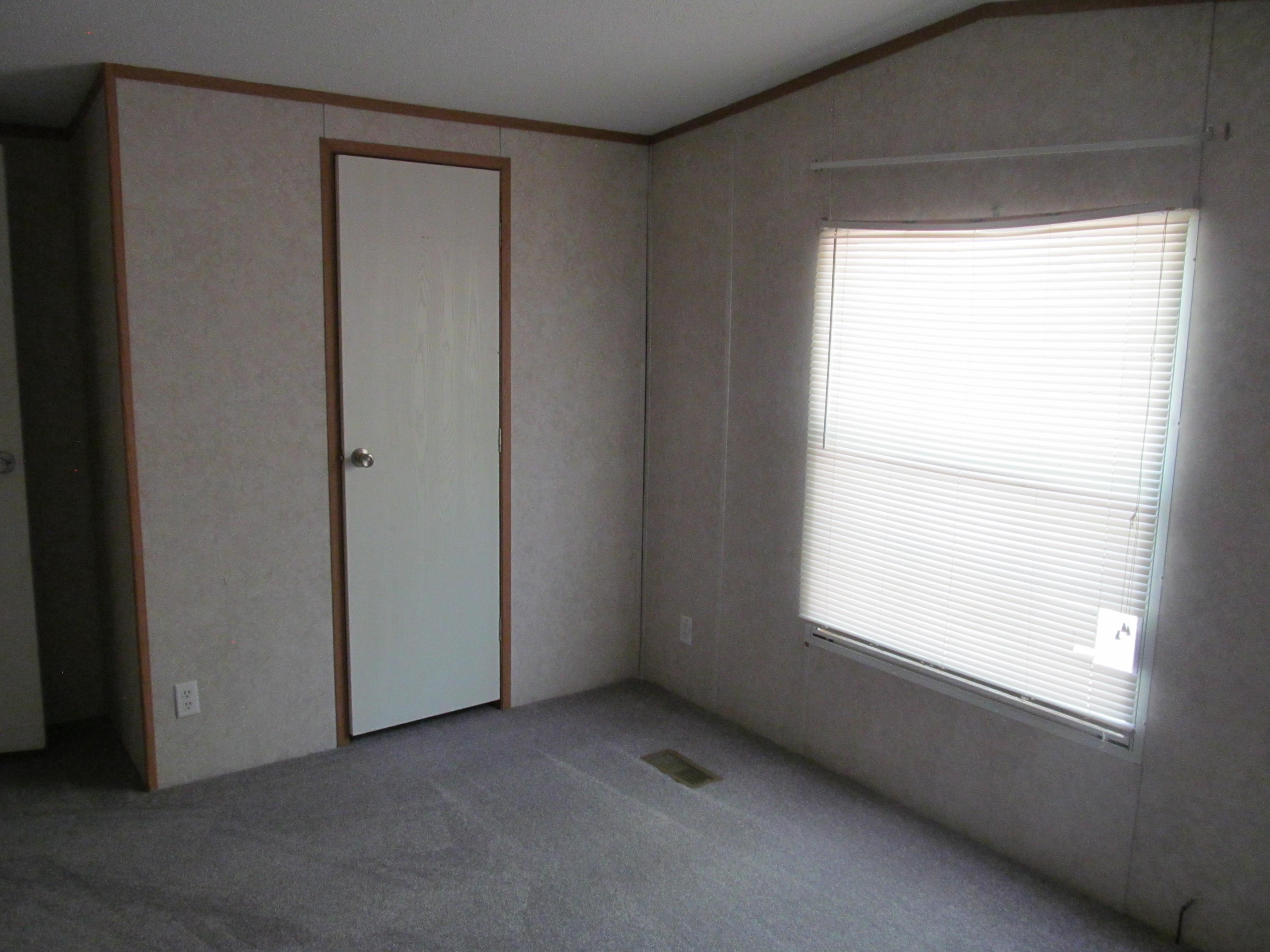 312 Piney Branch Road Blue Ridge, VA 24064 - Photo 14 of 21 a view of an empty room and window