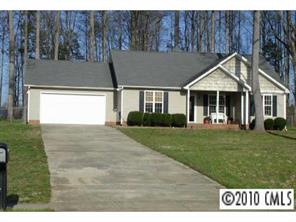 6922 Sullins Road Charlotte, NC 28214 - Photo 1 of 8 a front view of a house with a garden