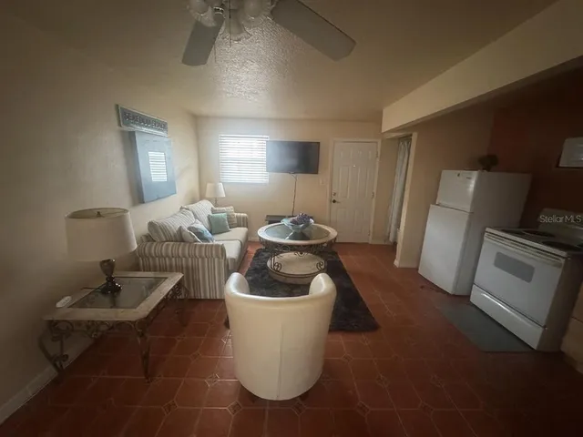 a room with a sink and a mirror