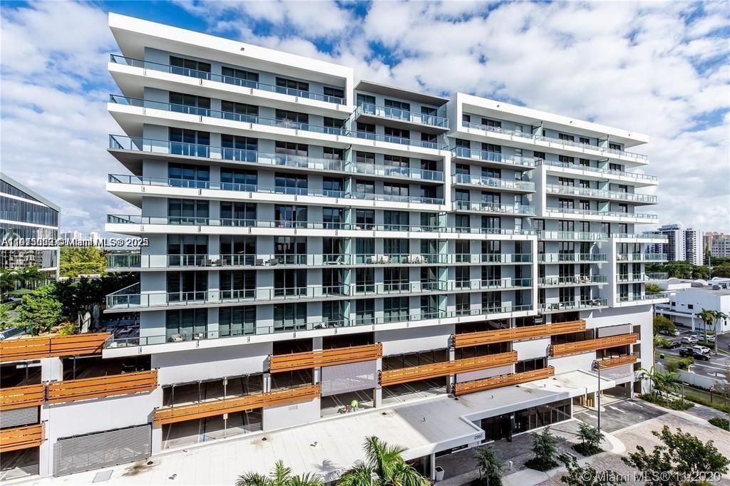 2960 Northeast 207th Street, Unit 1006 Aventura, FL 33180 - Photo 2 of 9 a reading room with pool table and chairs