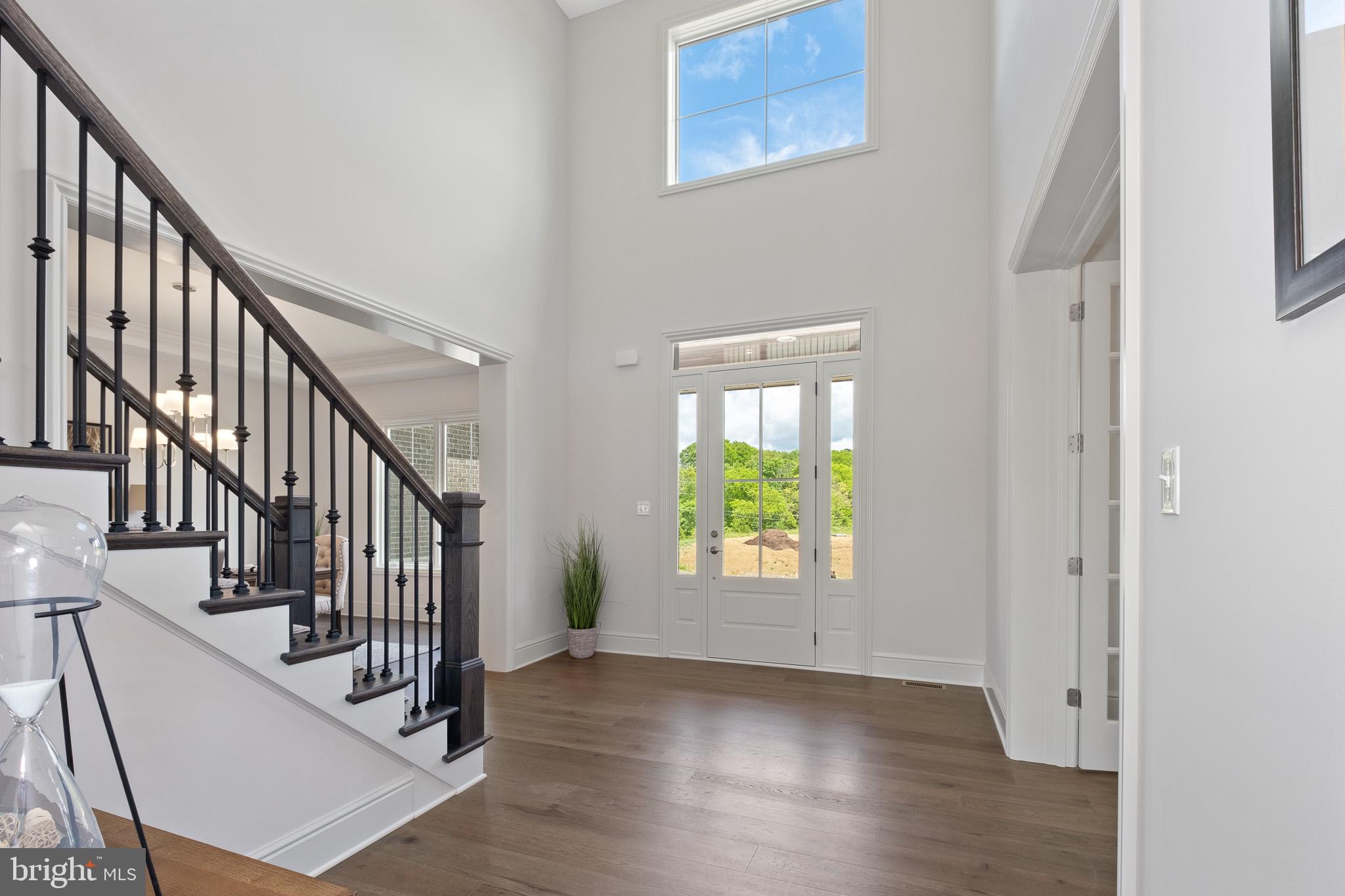 510 Newcomen Road, Unit R1D Exton, PA 19341 - Photo 2 of 51 a view of staircase with railing and a window