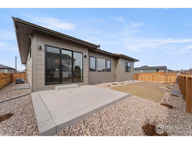 a house view with a backyard space