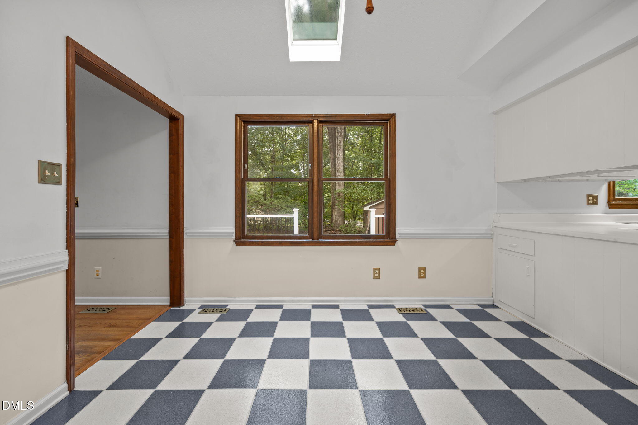 2713 Salisbury Plain Raleigh, NC 27613 - Photo 12 of 39 a black and white checkered floor with a black white checkered floor