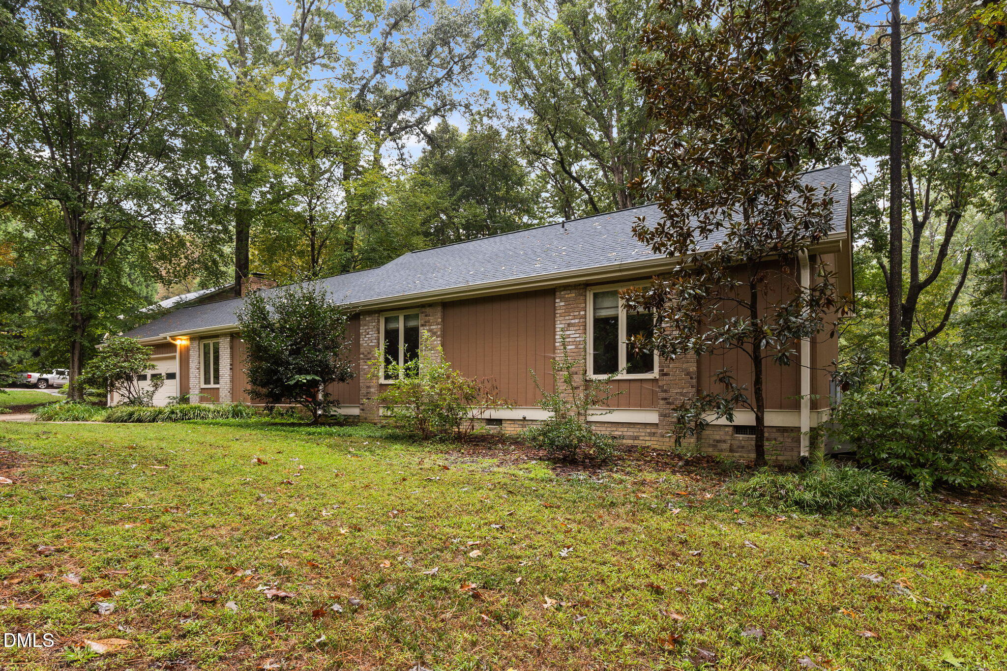 2713 Salisbury Plain Raleigh, NC 27613 - Photo 2 of 39 a front view of a house with garden
