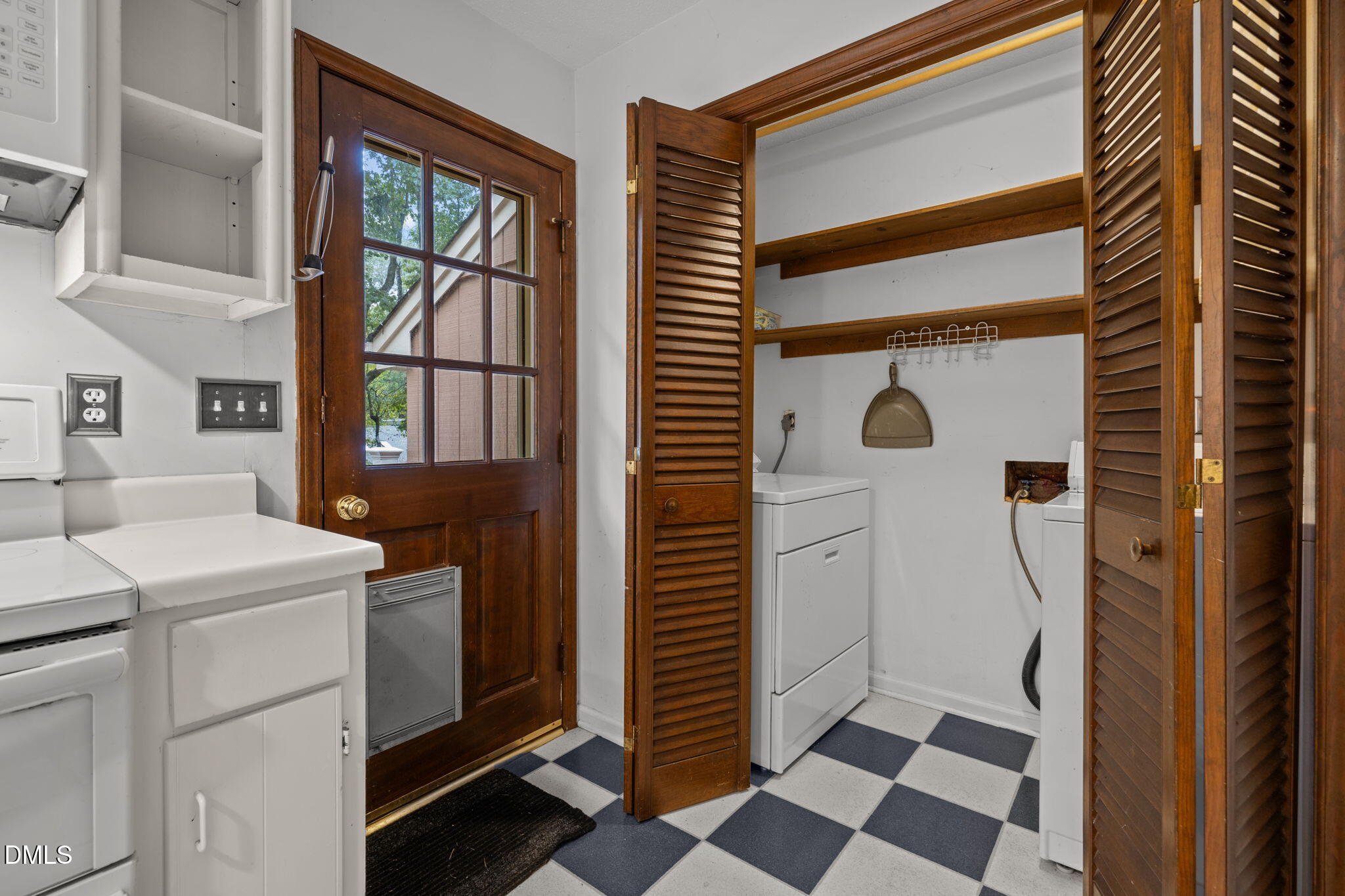 2713 Salisbury Plain Raleigh, NC 27613 - Photo 21 of 39 a kitchen with a refrigerator and a sink