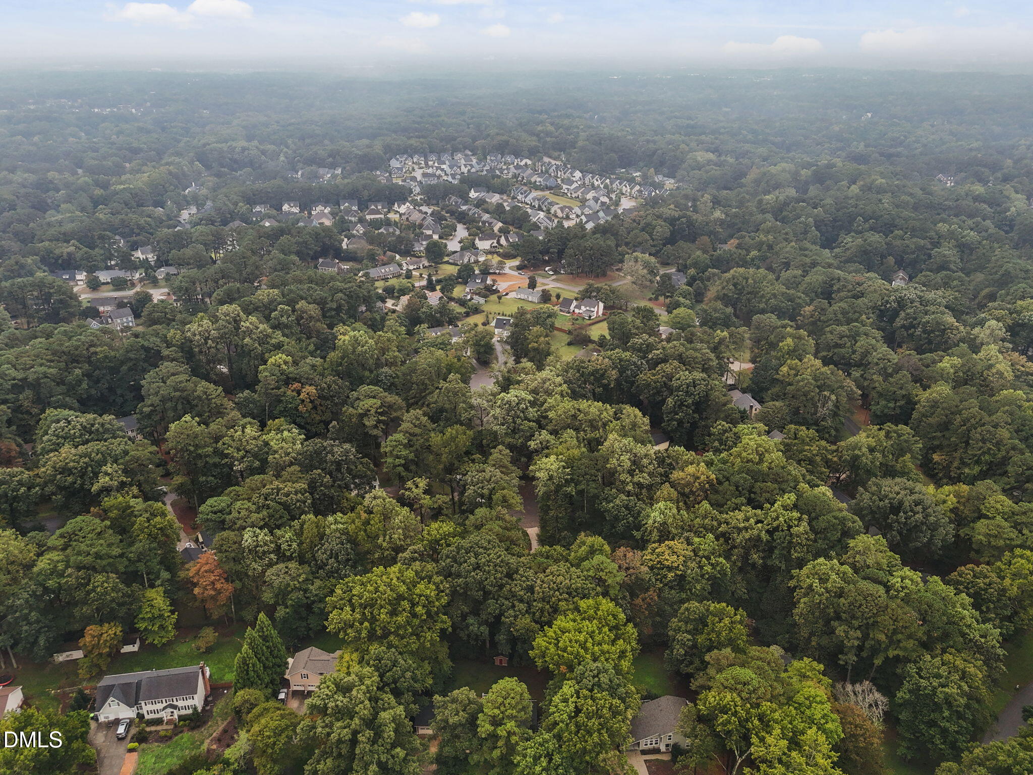 2713 Salisbury Plain Raleigh, NC 27613 - Photo 39 of 39 an aerial view of house with yard and mountain view in back