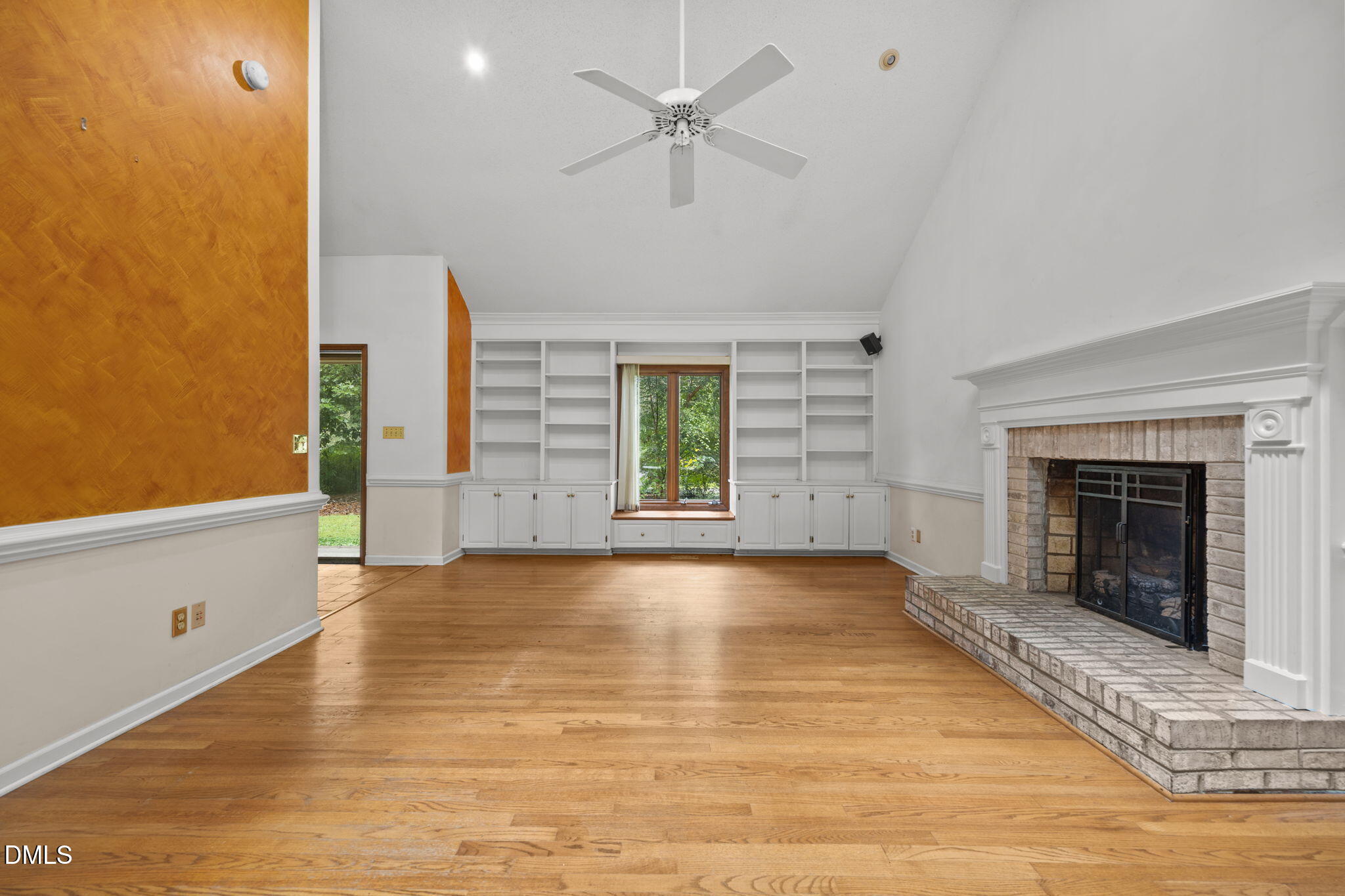 2713 Salisbury Plain Raleigh, NC 27613 - Photo 7 of 39 wooden floor in an empty room with a window