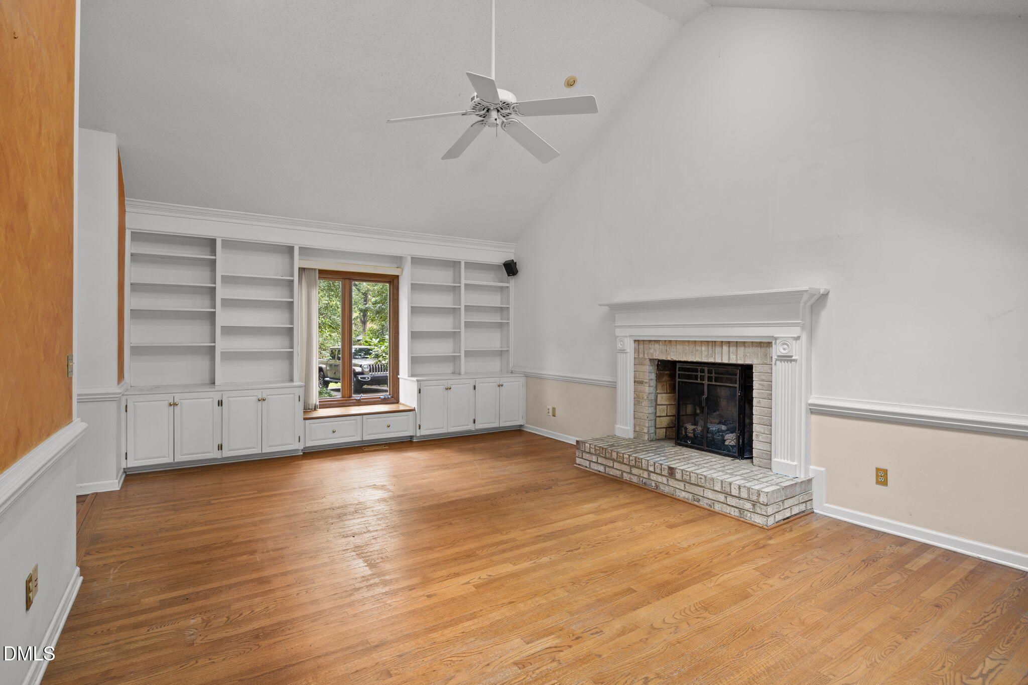 2713 Salisbury Plain Raleigh, NC 27613 - Photo 8 of 39 an empty room with windows fireplace and a sink