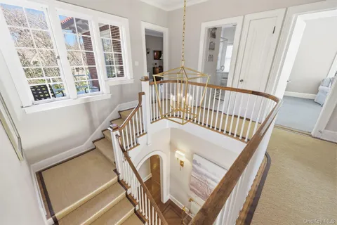 a view of an entryway with a staircase