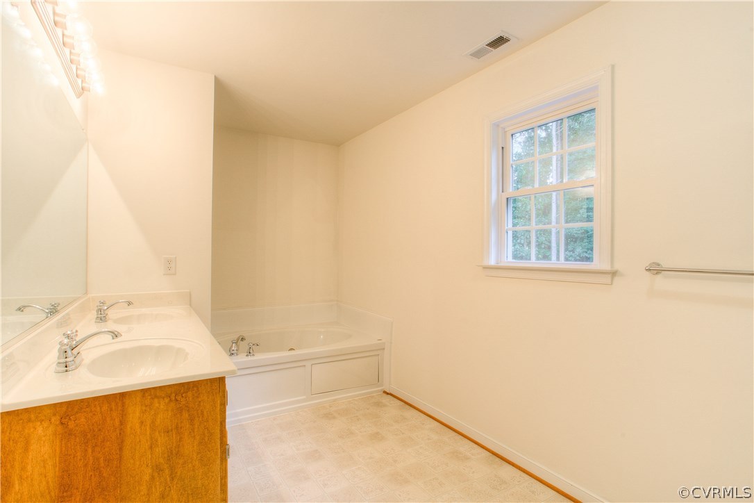 17436 Creekbed Road Chesterfield, VA 23838 - Photo 27 of 44 Owner's Bathroom is bright with natural light.
