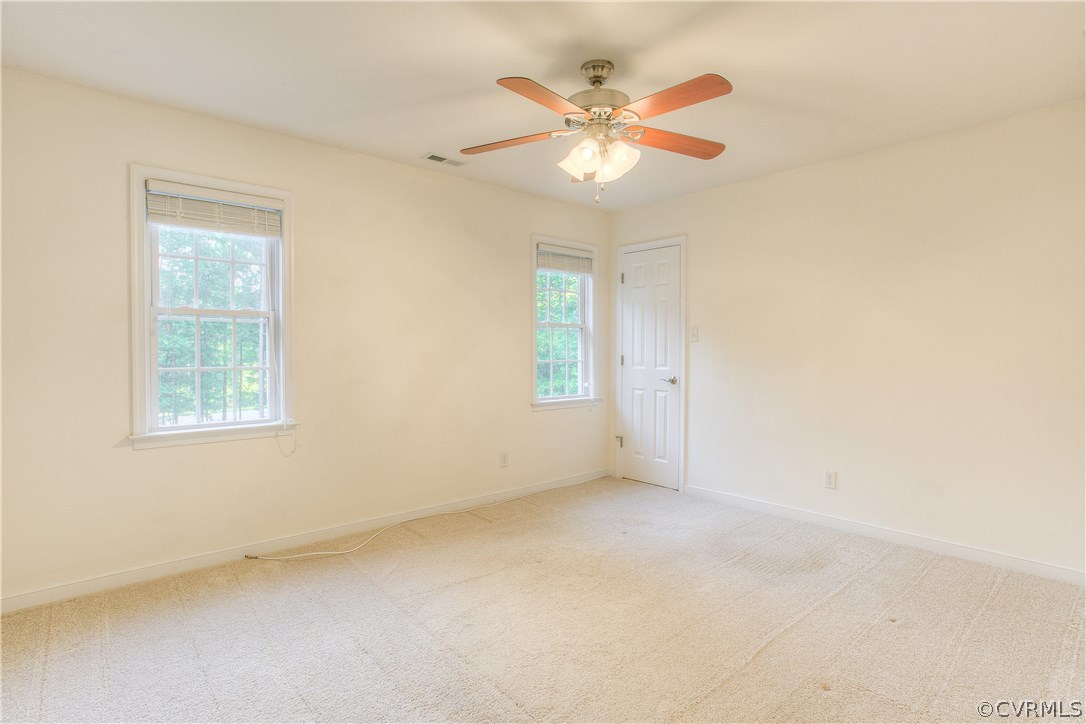 17436 Creekbed Road Chesterfield, VA 23838 - Photo 29 of 44 Bedroom #2 features a walk-in closet, ceiling fan,