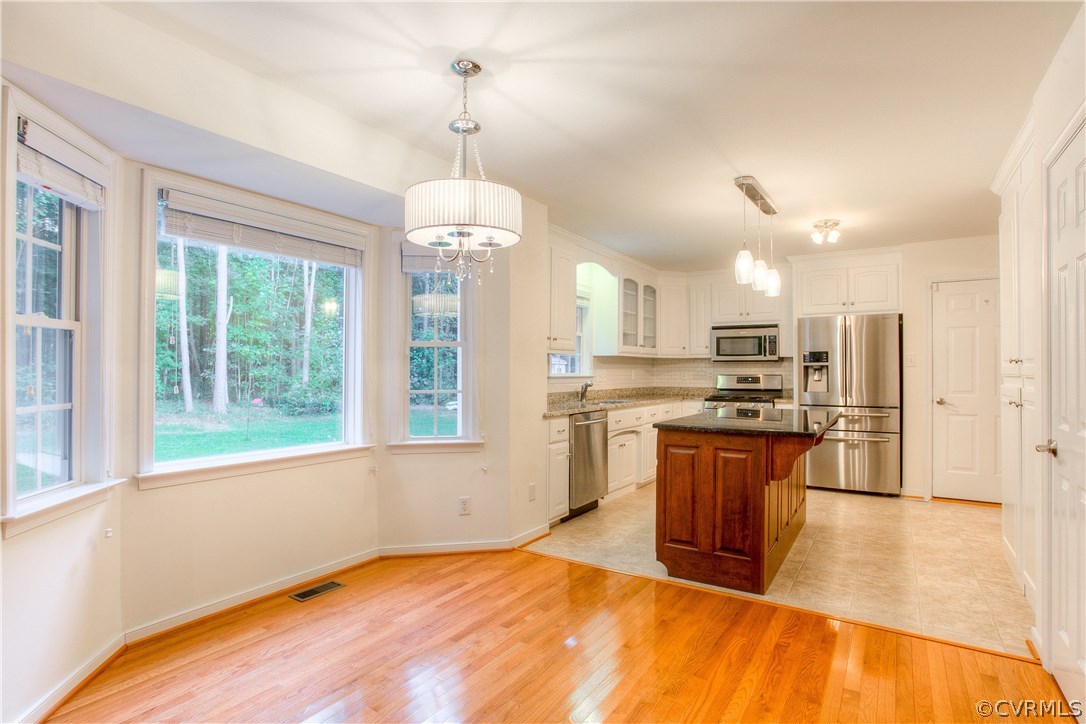 17436 Creekbed Road Chesterfield, VA 23838 - Photo 7 of 44 Spacious eat-in Nook with new lighting, hardwood f