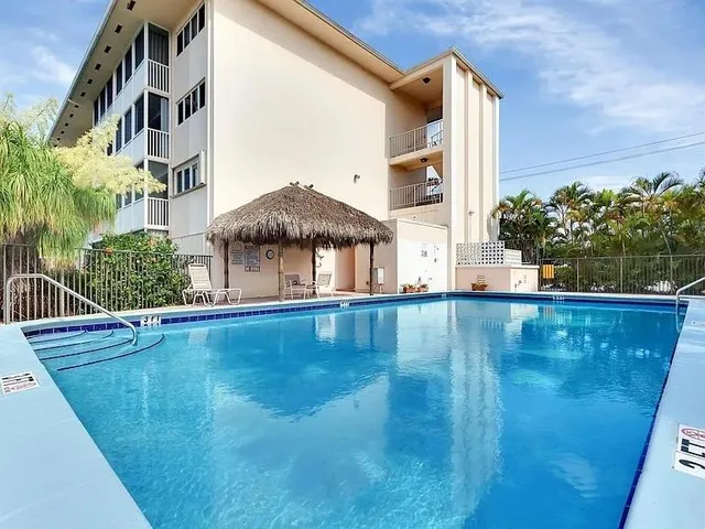 a view of an swimming pool with an outdoor space