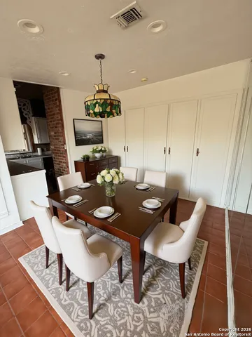 a view of a dining room with furniture
