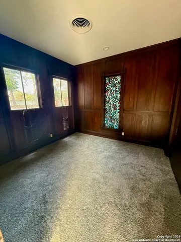 an empty room with windows