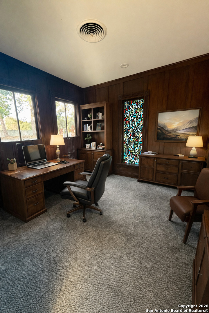 1111 Magnolia Street Uvalde, TX 78801 - Photo 13 of 34 a living room with furniture and a large window