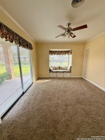 a view of an empty room and window