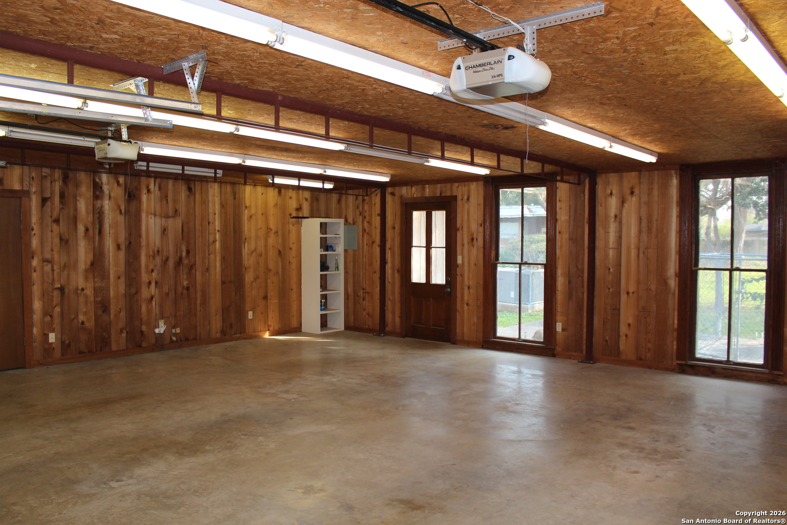 1111 Magnolia Street Uvalde, TX 78801 - Photo 23 of 34 an empty room with windows