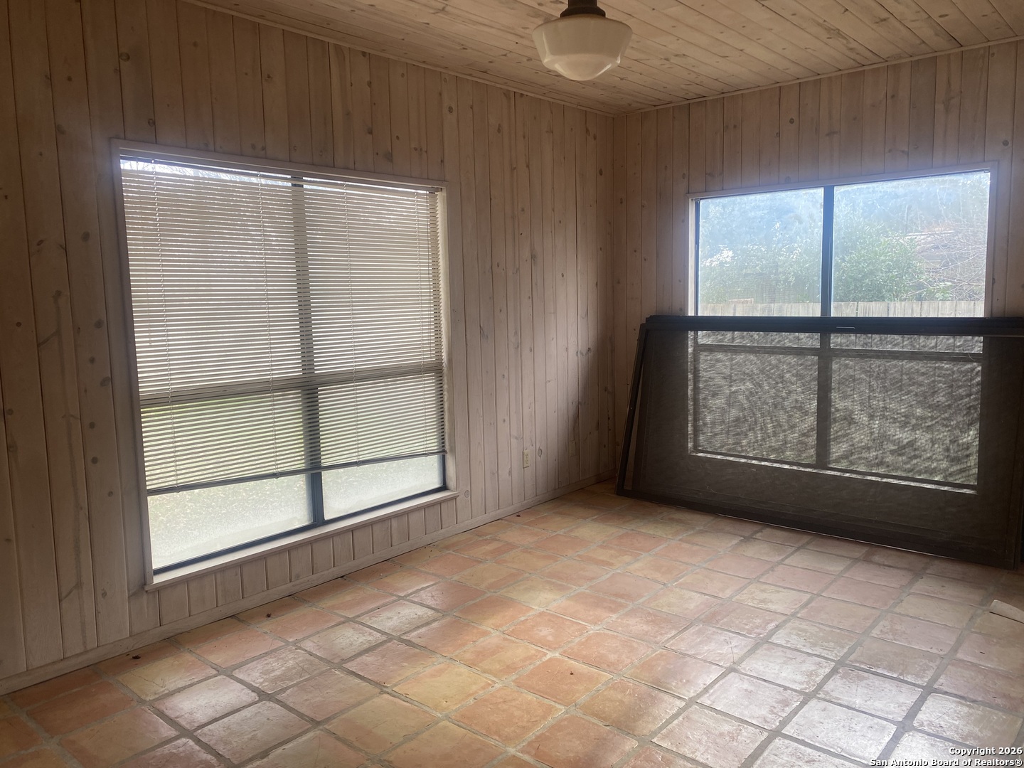 1111 Magnolia Street Uvalde, TX 78801 - Photo 32 of 34 an empty room with windows