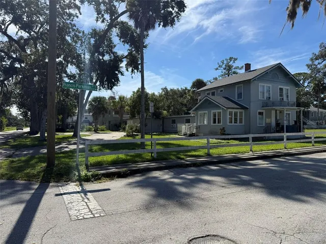 a view of swimming pool with sitting area