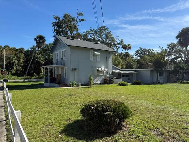 a house view with a garden space