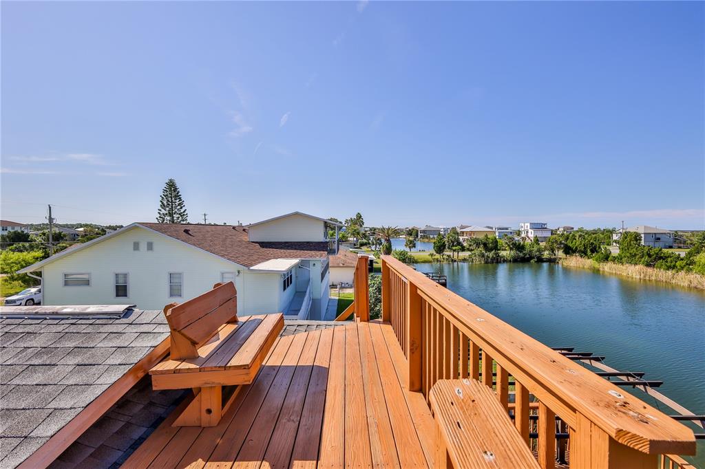 3397 Crape Myrtle Drive Hernando Beach, FL 34607 - Photo 20 of 76 a view of a house with pool and ocean view