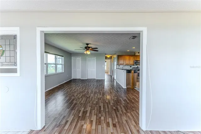 a bathroom with a double vanity sink and a toilet