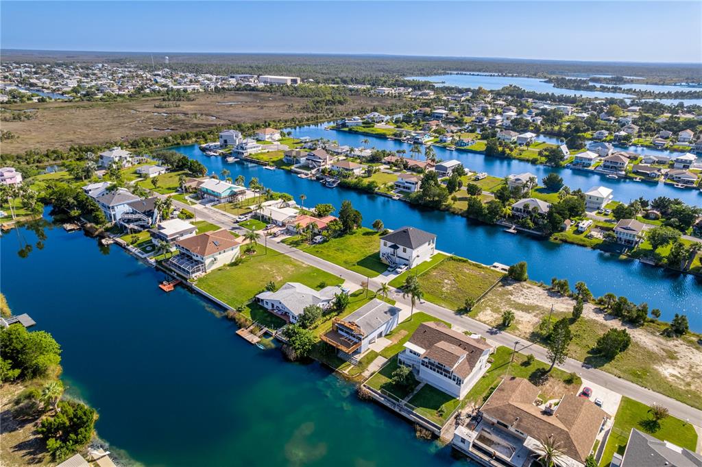 3397 Crape Myrtle Drive Hernando Beach, FL 34607 - Photo 34 of 76 an aerial view of a house with a ocean view