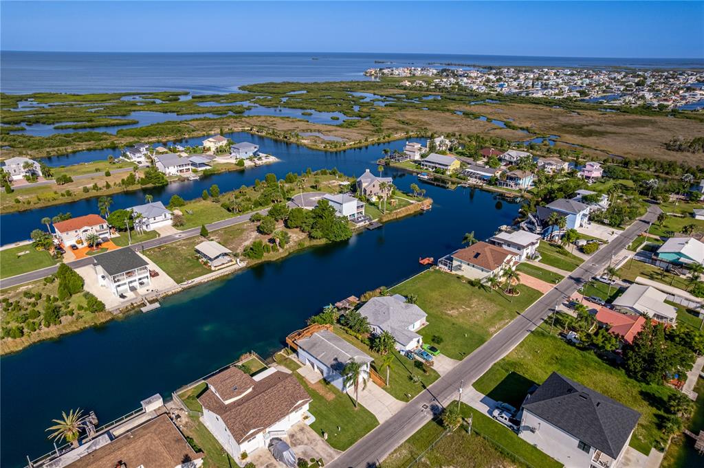 3397 Crape Myrtle Drive Hernando Beach, FL 34607 - Photo 47 of 76 an aerial view of residential houses with outdoor space